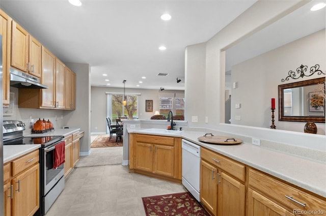 kitchen with white dishwasher, a sink, light countertops, electric stove, and under cabinet range hood