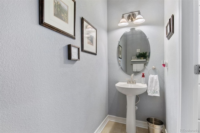 bathroom featuring baseboards