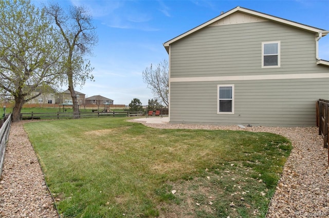 exterior space featuring a fenced backyard and a patio