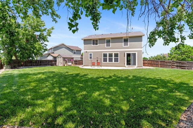 201 Shenandoah Way, Brighton, CO 80603 - back of property featuring a patio area