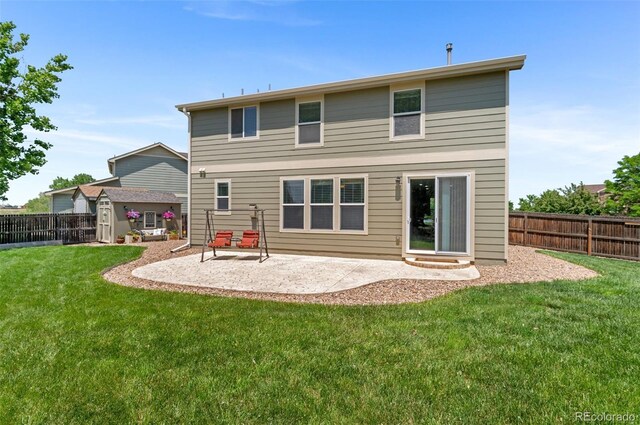 201 Shenandoah Way, Brighton, CO 80603 - back of property featuring a patio area