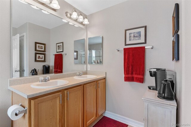 201 Shenandoah Way, Brighton, CO 80603 - full bath with double vanity and baseboards