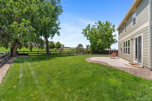 201 Shenandoah Way, Brighton, CO 80603 - view of yard with a patio area