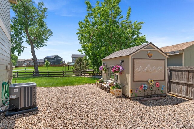 201 Shenandoah Way, Brighton, CO 80603 - view of yard with central AC unit