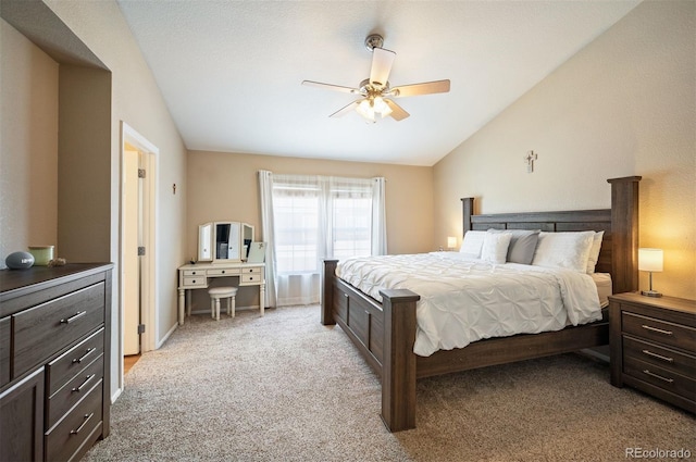 carpeted bedroom featuring ceiling fan and lofted ceiling