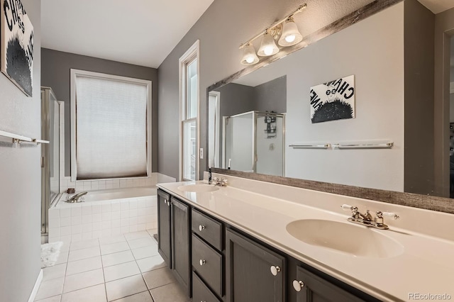 5136 S Ceylon St, Centennial, CO 80015 - bathroom with a garden tub, a shower stall, double vanity, and tile patterned flooring