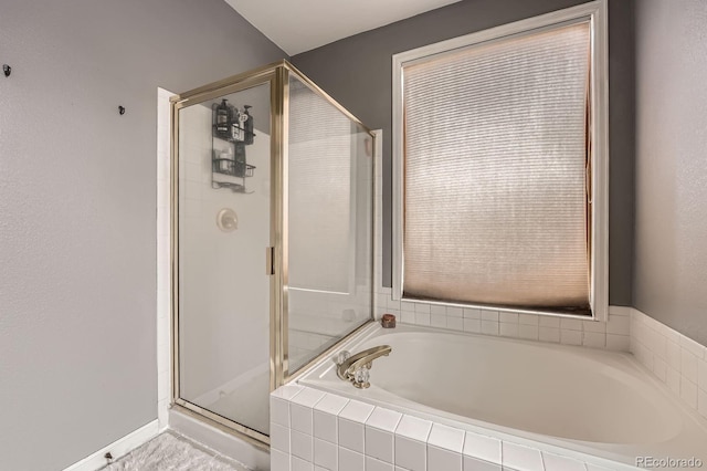 5136 S Ceylon St, Centennial, CO 80015 - bathroom with a bath and a stall shower