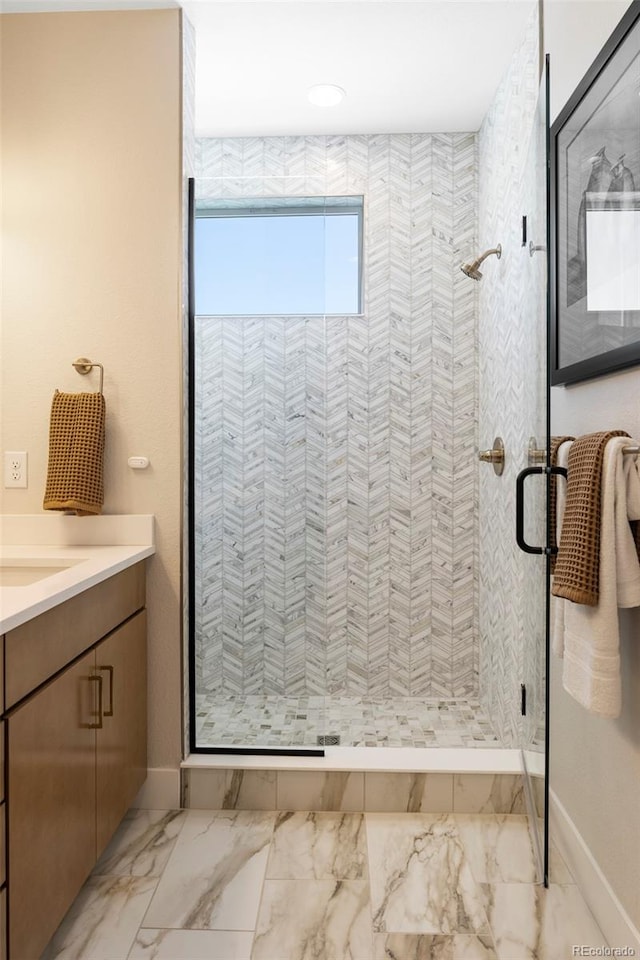 bathroom with vanity and an enclosed shower