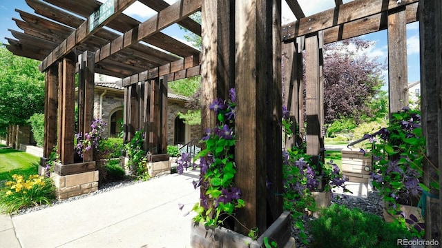 10328 Bluffmont Dr, Lone Tree, CO 80124 - view of community featuring a pergola and a patio