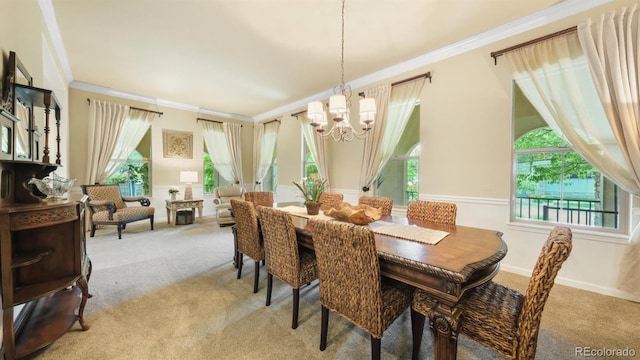 10328 Bluffmont Dr, Lone Tree, CO 80124 - dining space featuring carpet, a chandelier, and ornamental molding