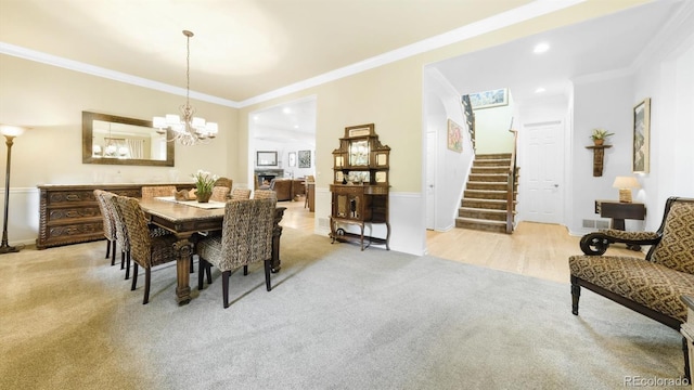 10328 Bluffmont Dr, Lone Tree, CO 80124 - dining room with carpet flooring, stairs, crown molding, a chandelier, and recessed lighting
