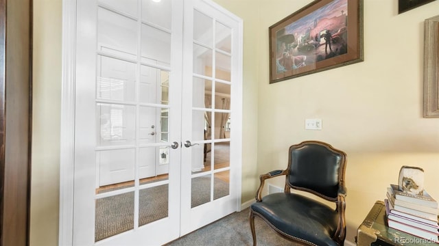 10328 Bluffmont Dr, Lone Tree, CO 80124 - sitting room with carpet floors and french doors