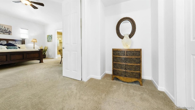 10328 Bluffmont Dr, Lone Tree, CO 80124 - carpeted bedroom with baseboards and ceiling fan