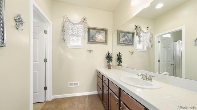 10328 Bluffmont Dr, Lone Tree, CO 80124 - bathroom with vanity and baseboards
