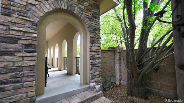 10328 Bluffmont Dr, Lone Tree, CO 80124 - doorway to property with brick siding