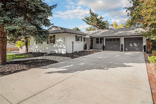 single story home featuring a garage