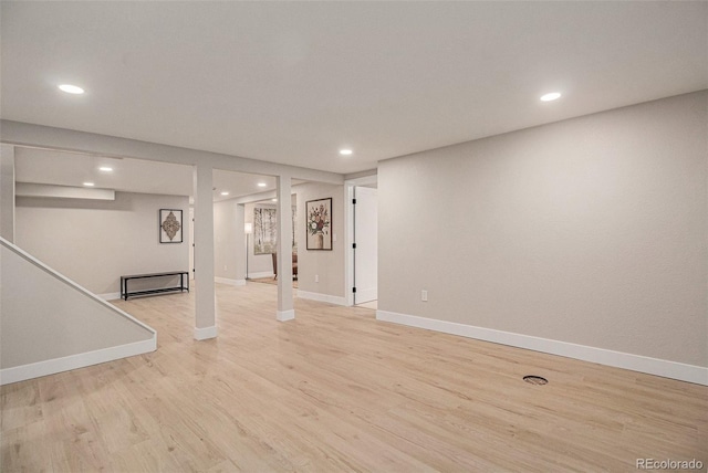 basement featuring light wood-type flooring