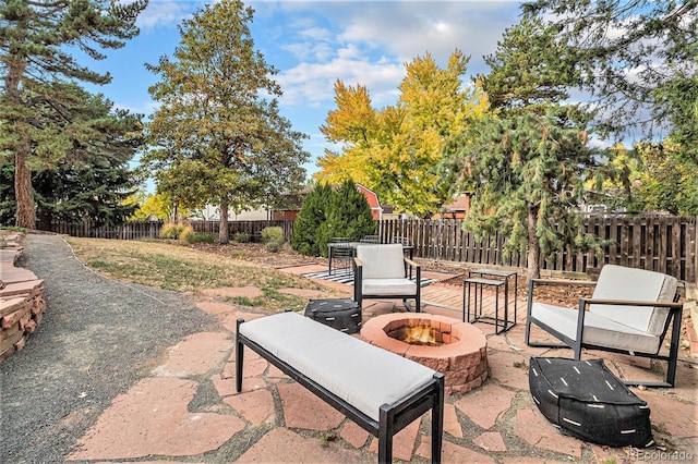 view of patio / terrace with a fire pit