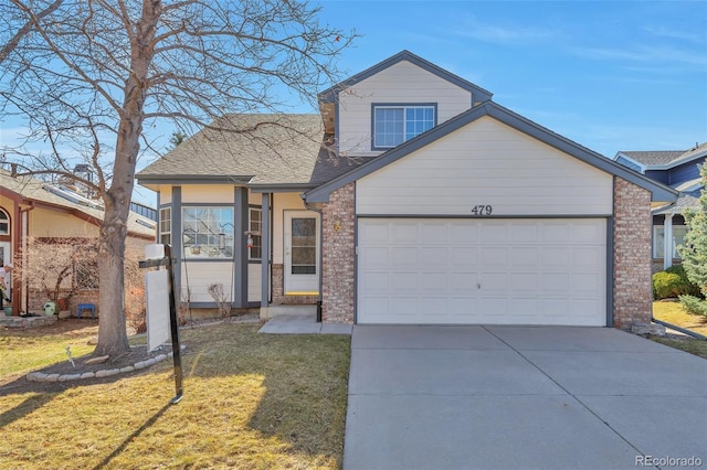 view of front of property with brick siding, a front lawn, concrete driveway, roof with shingles, and a garage