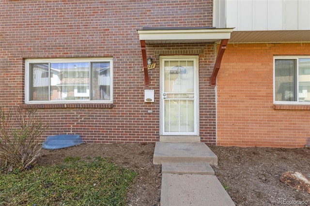 9044 E Nassau Ave, Denver, CO 80237 - doorway to property with brick siding