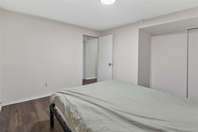 9044 E Nassau Ave, Denver, CO 80237 - bedroom with wood finished floors and baseboards