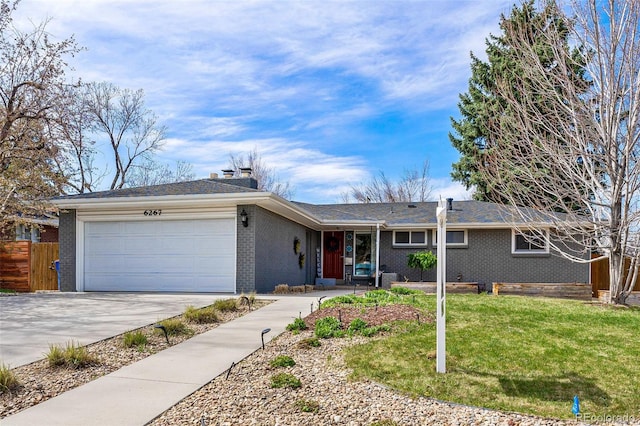 6267 S Josephine Way, Centennial, CO 80121 - ranch-style house with brick siding, an attached garage, concrete driveway, and a chimney