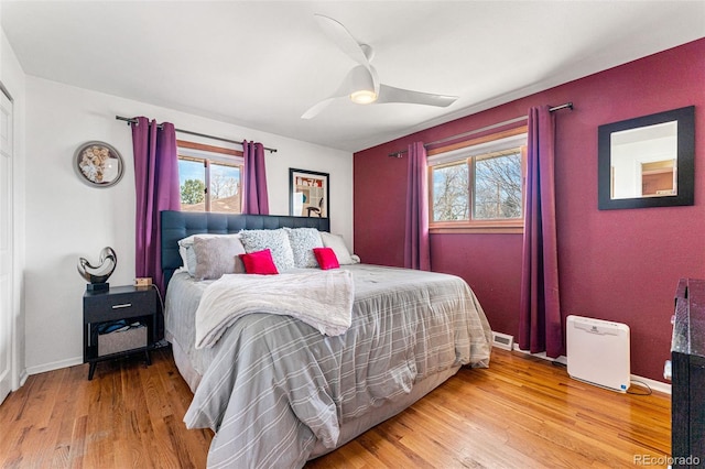 6267 S Josephine Way, Centennial, CO 80121 - bedroom with multiple windows, light wood-type flooring, and ceiling fan