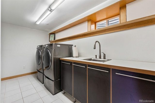 6267 S Josephine Way, Centennial, CO 80121 - washroom featuring washing machine and dryer and light tile patterned flooring