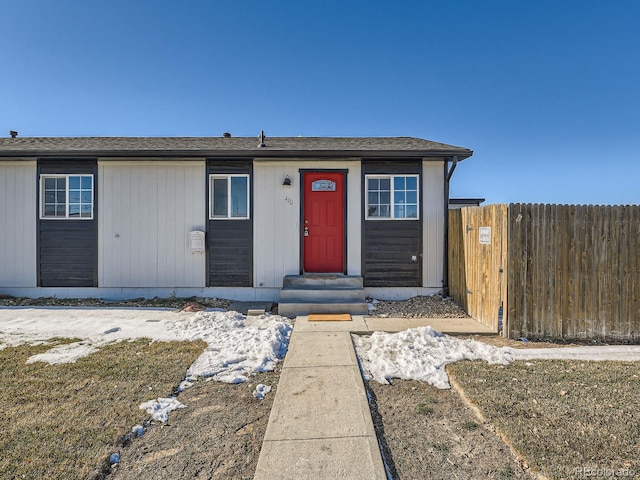 490 Washington Ave Unit A, Bennett, CO 80102 - view of front of house featuring fence