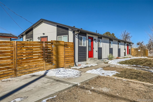 490 Washington Ave Unit A, Bennett, CO 80102 - view of front of property featuring entry steps and fence