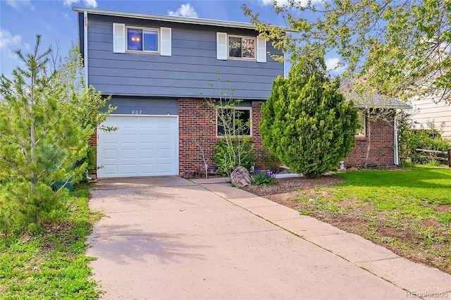 view of front of house with brick siding, concrete driveway, an attached garage, and a front lawn