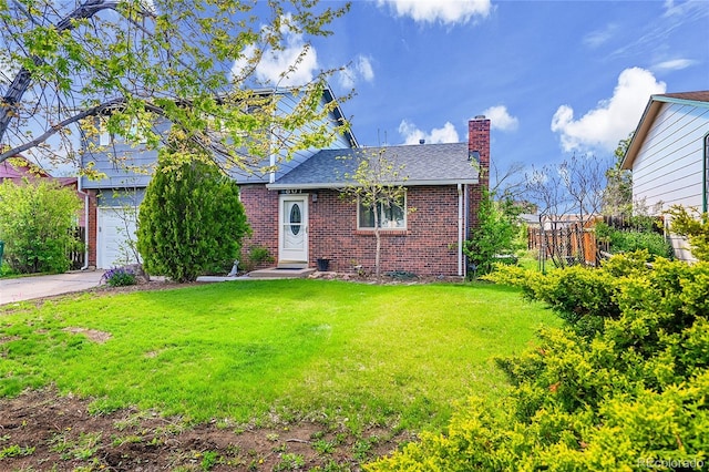 bungalow-style home featuring a chimney, brick siding, a front yard, an attached garage, and concrete driveway