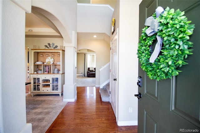 entryway with hardwood / wood-style flooring