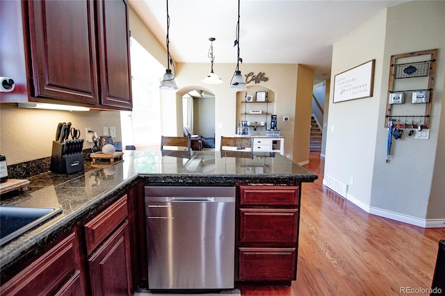 kitchen with pendant lighting, light hardwood / wood-style floors, kitchen peninsula, and dishwasher