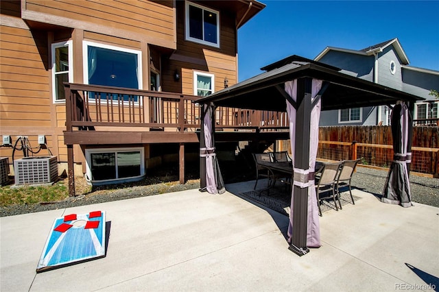 view of patio featuring a gazebo and cooling unit