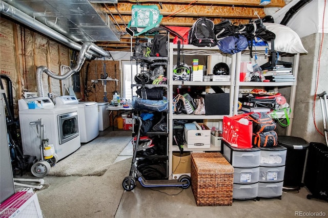 basement featuring washing machine and clothes dryer