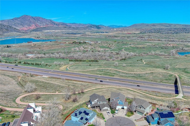 4142 S Deframe Ct, Morrison, CO 80465 - aerial view featuring a water and mountain view
