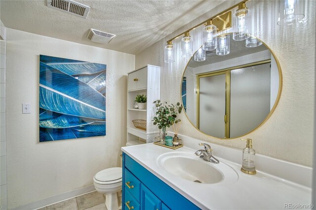 4142 S Deframe Ct, Morrison, CO 80465 - bathroom with toilet, a textured ceiling, visible vents, and vanity