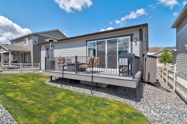rear view of property with a deck