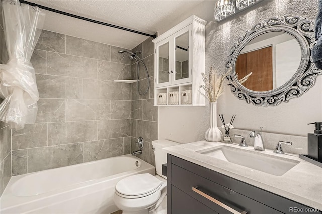 8225 Fairmount Dr Unit 104, Denver, CO 80247 - bathroom featuring toilet, shower / bath combination with curtain, a textured ceiling, and vanity