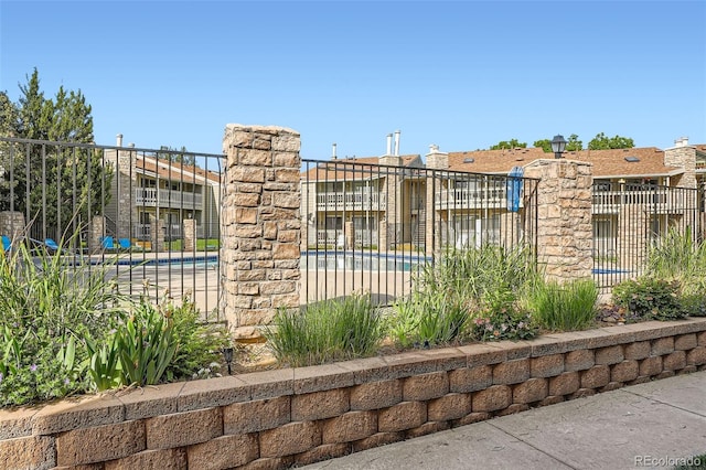 8225 Fairmount Dr Unit 104, Denver, CO 80247 - view of building exterior featuring a community pool