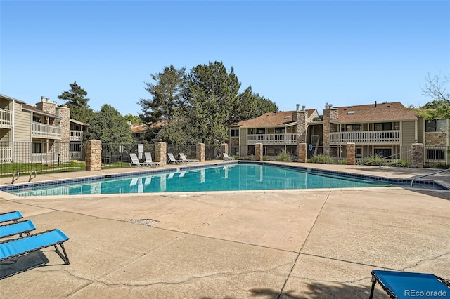 8225 Fairmount Dr Unit 104, Denver, CO 80247 - community pool with a patio