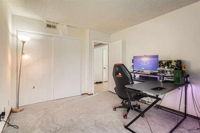 8225 Fairmount Dr Unit 104, Denver, CO 80247 - carpeted office featuring a textured ceiling