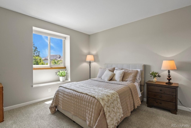 2146 S Ellis Ct, Lakewood, CO 80228 - bedroom with light colored carpet and baseboards