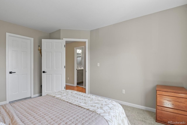 2146 S Ellis Ct, Lakewood, CO 80228 - bedroom with baseboards and light colored carpet
