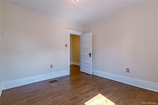 131 Fox St, Denver, CO 80223 - unfurnished room featuring wood finished floors and baseboards