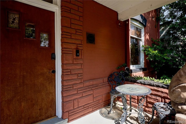 131 Fox St, Denver, CO 80223 - doorway to property featuring a patio area