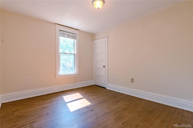 131 Fox St, Denver, CO 80223 - empty room with wood finished floors