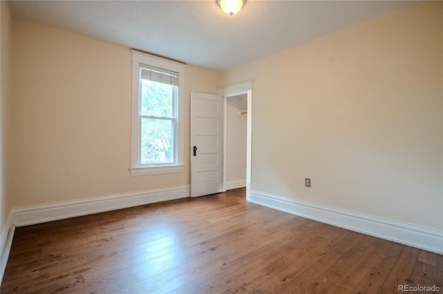131 Fox St, Denver, CO 80223 - empty room featuring wood finished floors and baseboards
