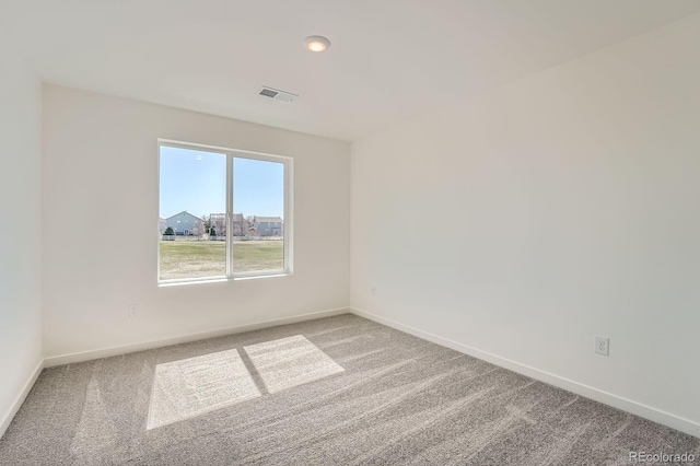 1290 S Algonquian St, Aurora, CO 80018 - carpeted empty room with baseboards and recessed lighting